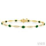 4X3 MM Oval Cut Emerald and 1/4 Ctw Round Cut Diamond Precious Bracelet in 10K Yellow Gold