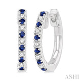 1/10 ctw Petite 1.35MM Sapphire and Round Cut Diamond Precious Fashion Huggies in 10K White Gold